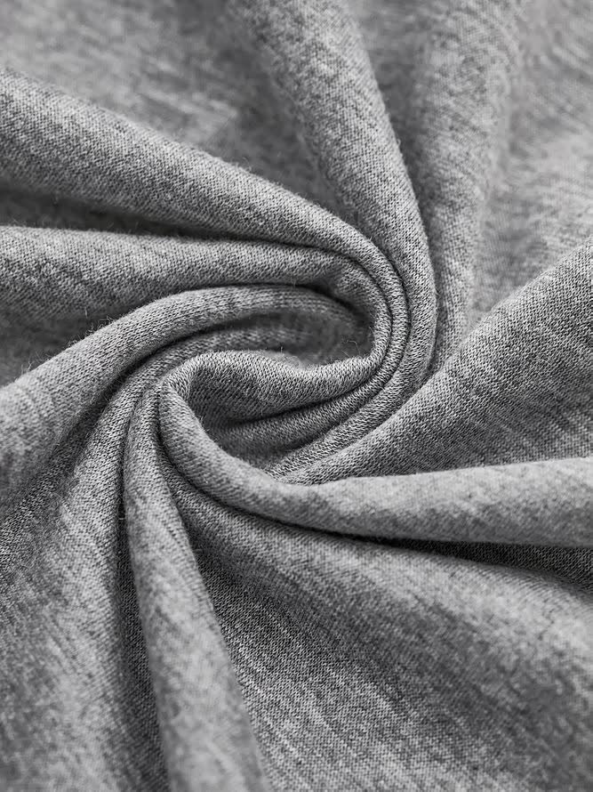 T-shirt décontracté à manches longues et col rond de couleur unie