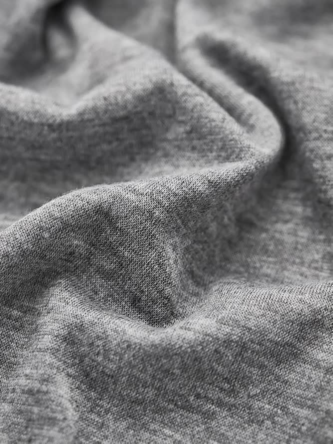 T-shirt décontracté à manches longues et col rond de couleur unie