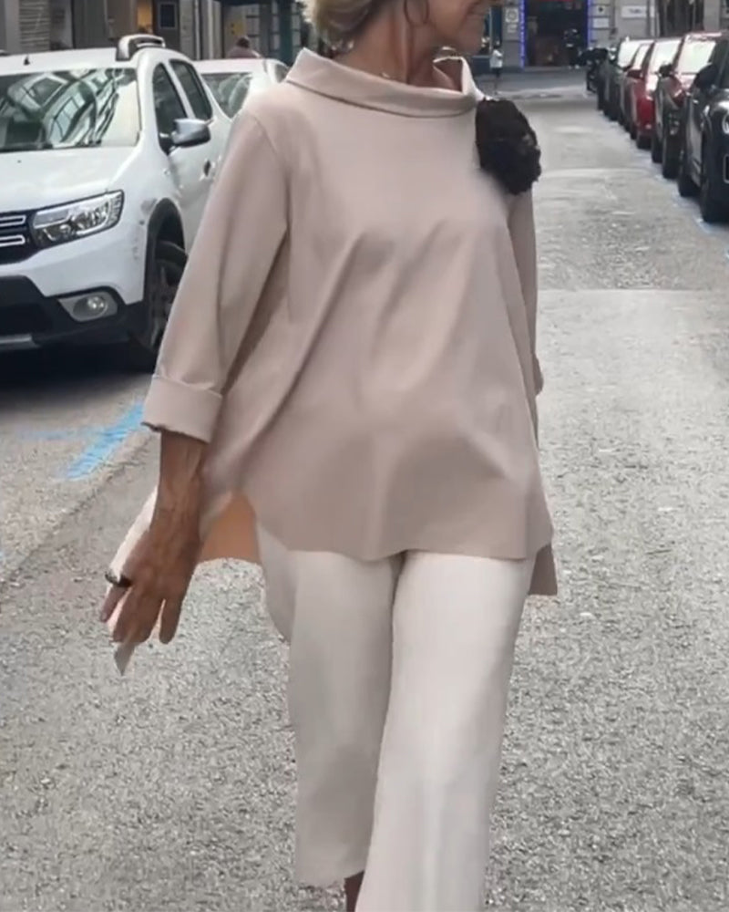 Elegante blouse met een onregelmatige snit en lange mouwen