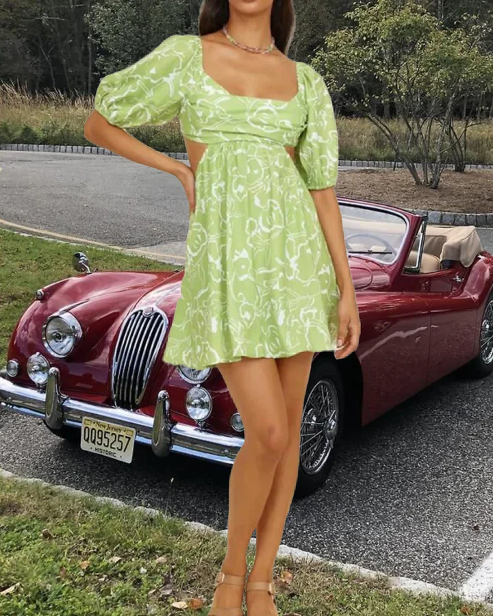 Madalynn | DAMESJURK MET UITGEHOLDE ZIJDES EN BLOEMENPRINT