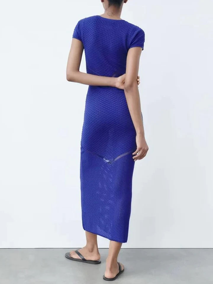 Kimberly | DAMES JURK MET RONDE HALS, HOGE TAILLE EN UITGEHOLDE DETAILS