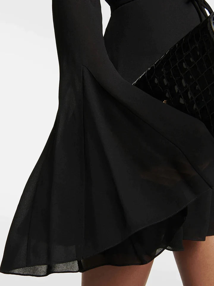 Rosemary | ES JURK MET OPEN RUG, HOGE TAILLE EN VETERDETAILS - MINI-JURK