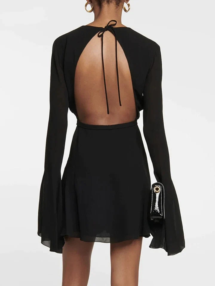 Rosemary | ES JURK MET OPEN RUG, HOGE TAILLE EN VETERDETAILS - MINI-JURK