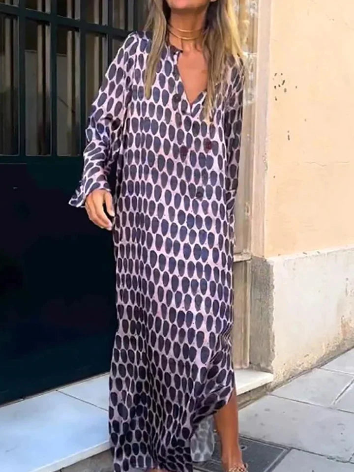 Jocelyn | DAMES JURK MET GEOMETRISCHE PRINT EN ZIJDELEN MET SPLITS