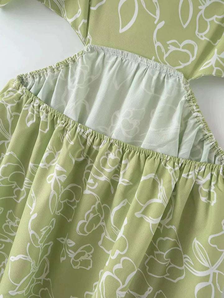 Madalynn | DAMESJURK MET UITGEHOLDE ZIJDES EN BLOEMENPRINT