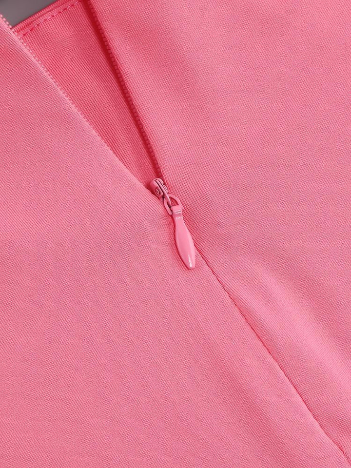 Valeria | DAMES MOUWLOZE JURK MET HOGE TAILLE EN UITGESNEDEN DETAILS