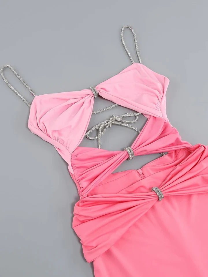 Valeria | DAMES MOUWLOZE JURK MET HOGE TAILLE EN UITGESNEDEN DETAILS