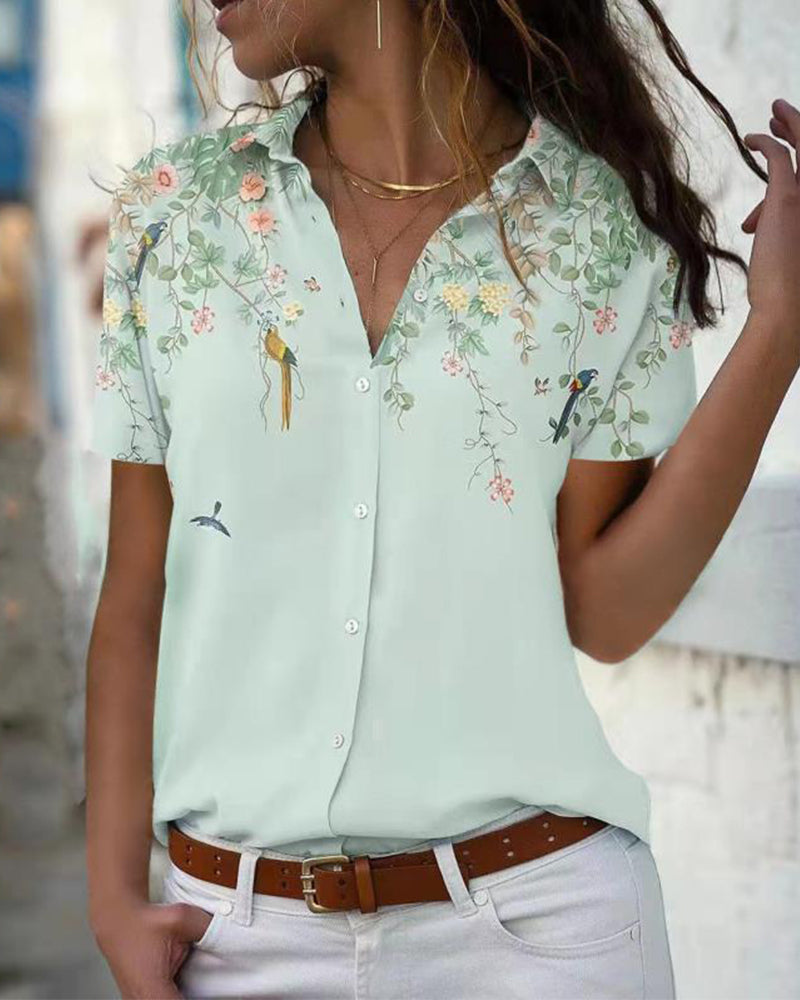 Blouse chic à motif fleuri et col classique