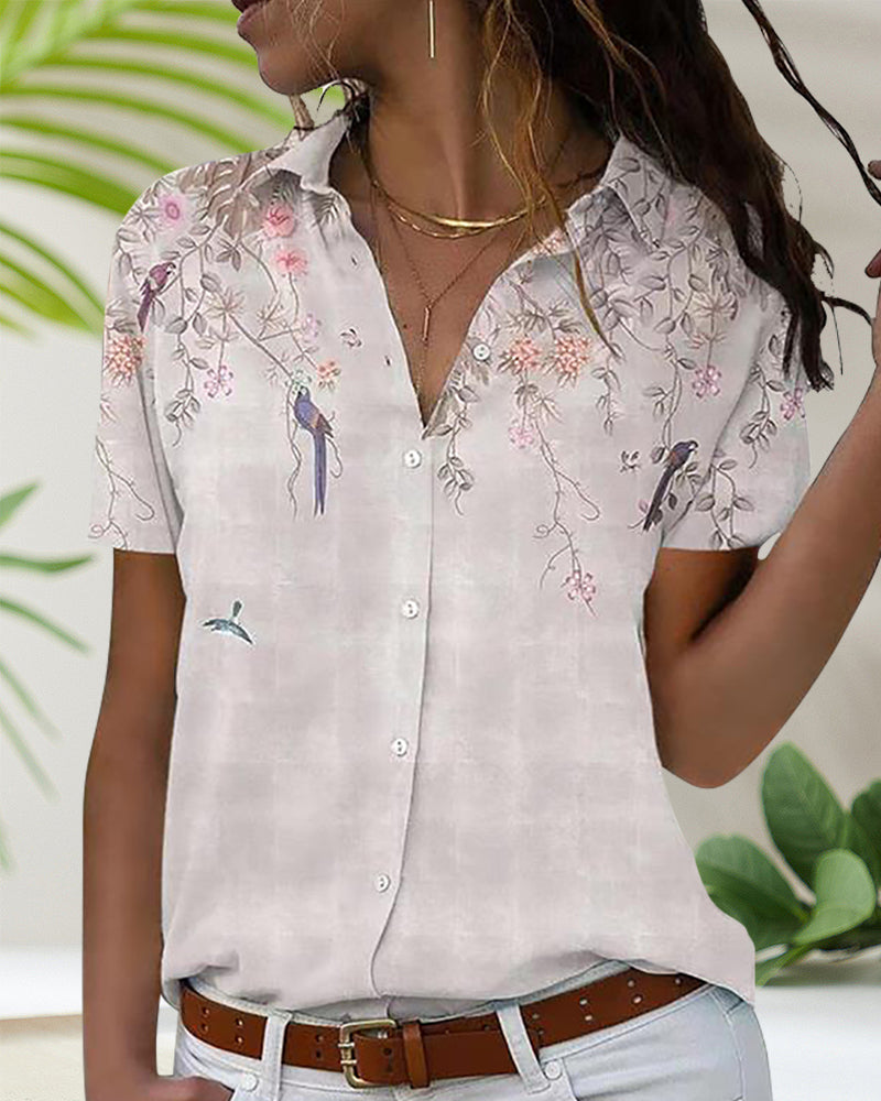 Blouse chic à motif fleuri et col classique