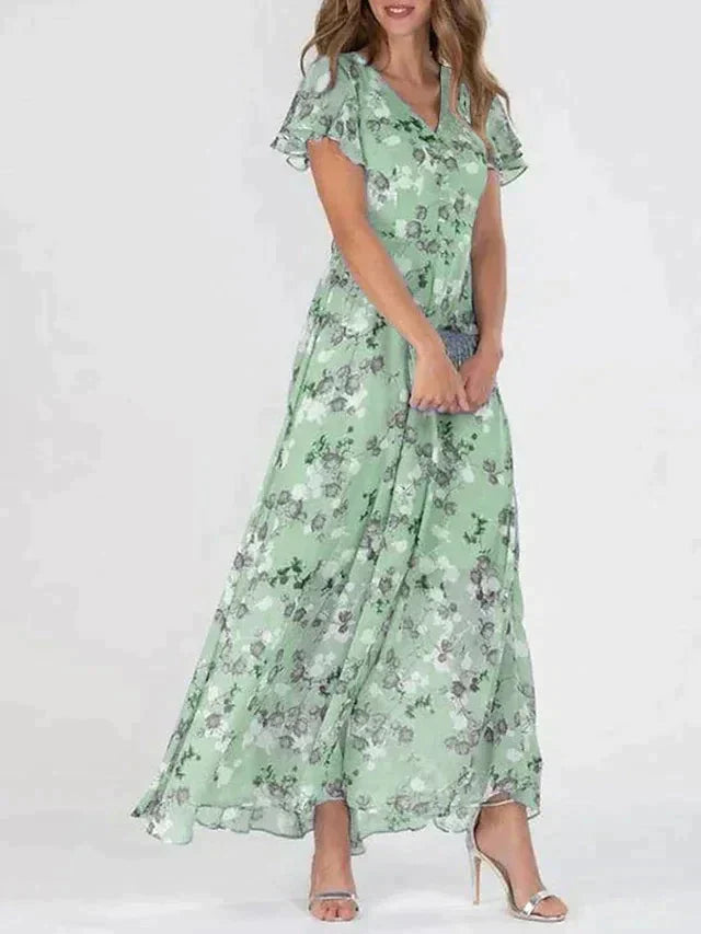 Robe longue cripes à fleurs et volants