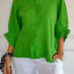 Blouse élégante avec boutons