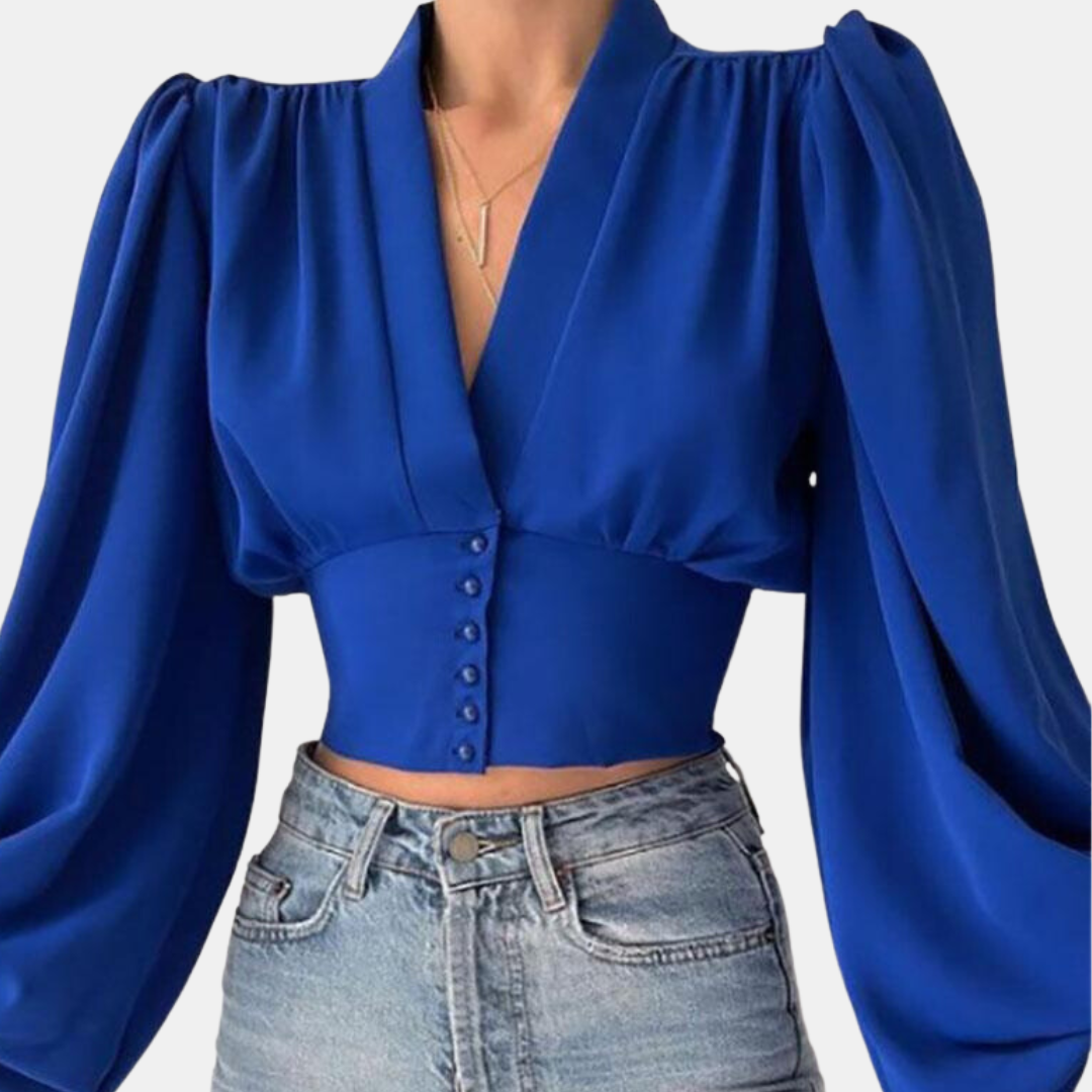 Blouse à manches bouffantes à la mode avec décolleté en V