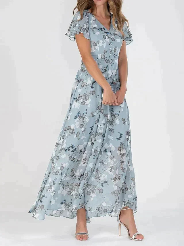 Robe longue cripes à fleurs et volants