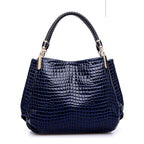 Schultertasche mit Krokodilmuster