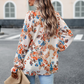 Blouse élégante à fleurs