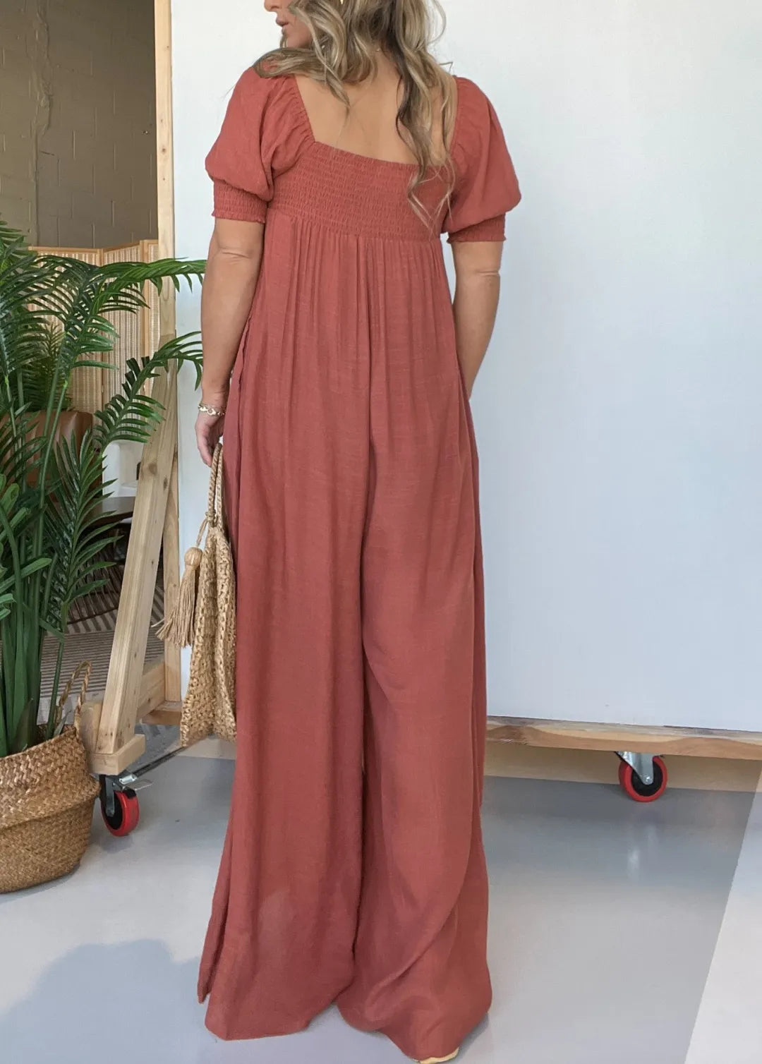 Robe de femme avec corsage smocké Bouton