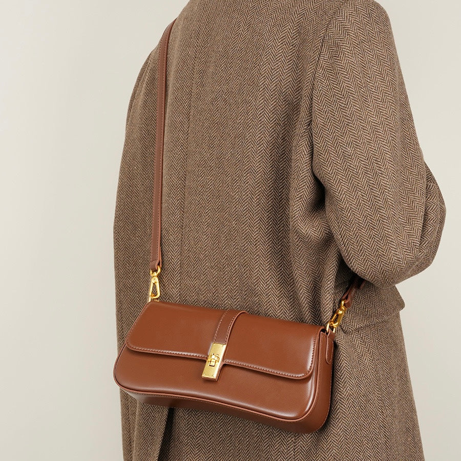 Damen Baguette Tasche mit goldener Drehverschluss