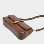 Damen Baguette Tasche mit goldener Drehverschluss