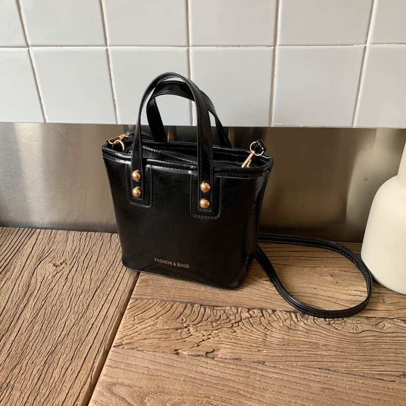 Damen Mini-Handtasche mit elegantem Tragegriff und praktischem Innenfach
