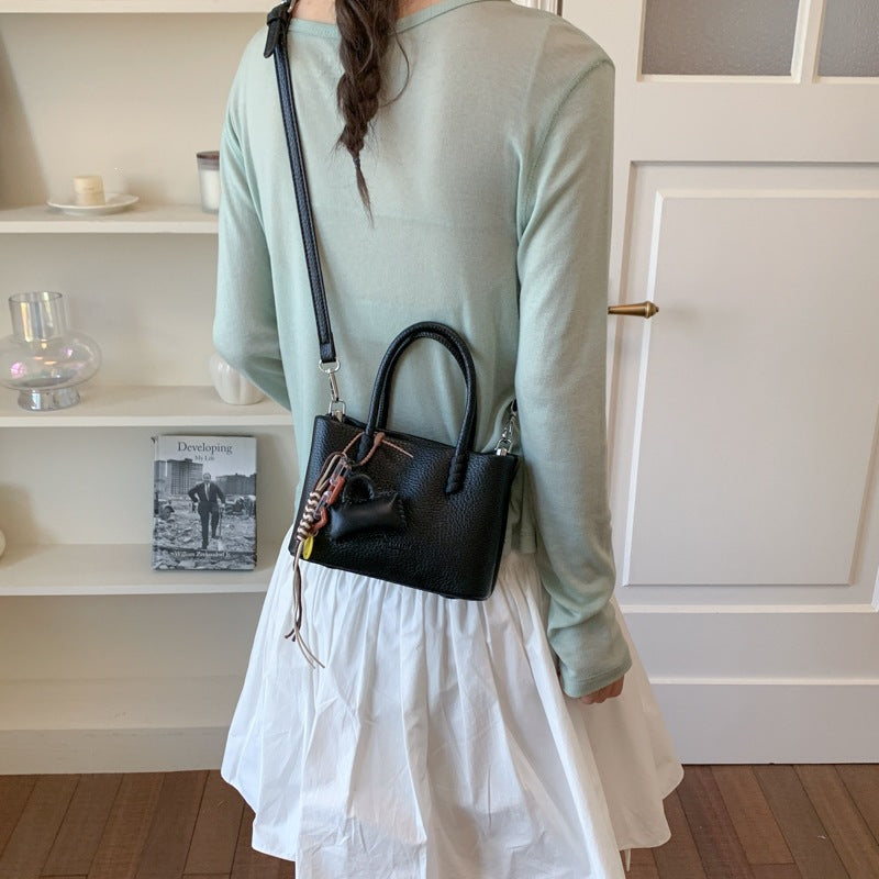 Damen Mini-Handtasche mit modischem Kordelzug