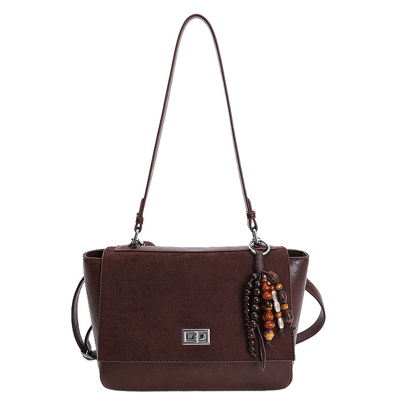 Damen elegante Schultertasche aus hochwertigem Kunstleder mit verspieltem Charme
