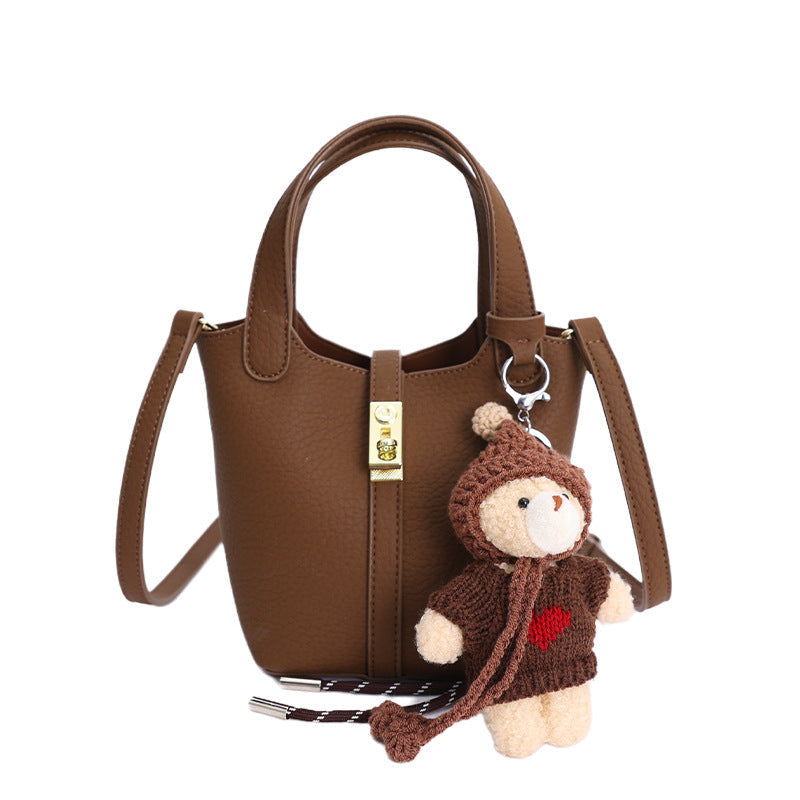 Damen Mini-Handtasche mit verspieltem Tieranhänger