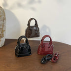Damen Mini-Handtasche mit glänzender Oberfläche und modischem Reißverschluss