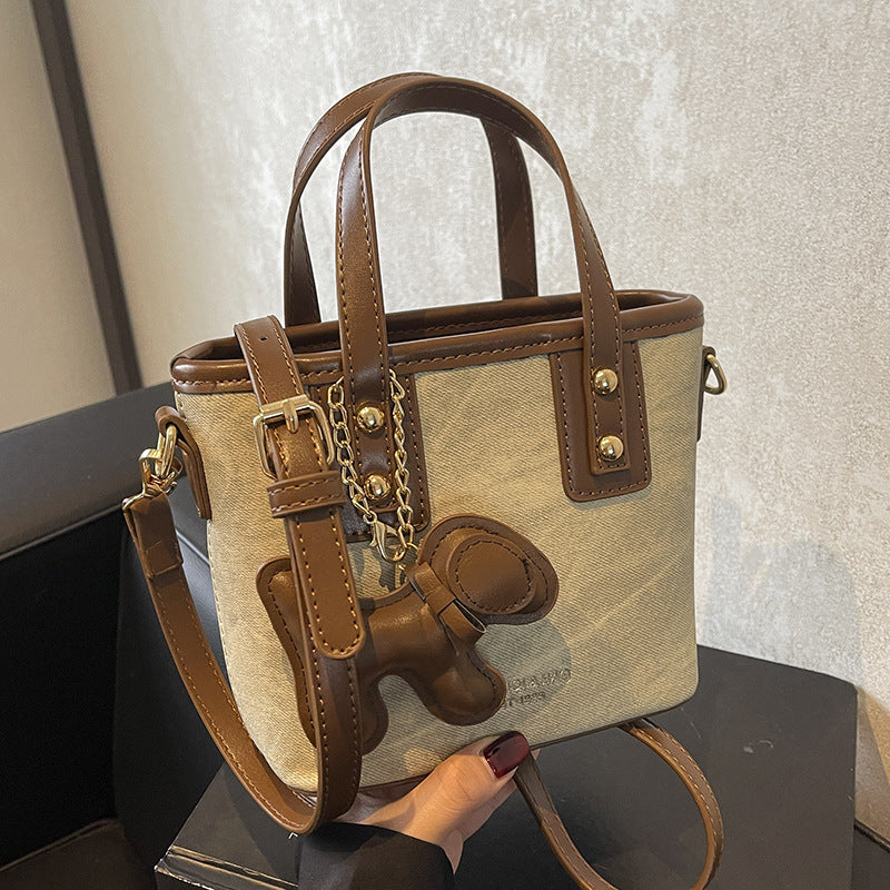 Damen Mini-Handtasche mit abnehmbarem Charm