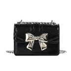 Damen Mini-Handtasche mit schimmerndem Schleifenverschluss