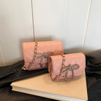 Damen-Mini-Handtasche mit luxuriösem, gestepptem Muster und funkeldem Kettenanhänger