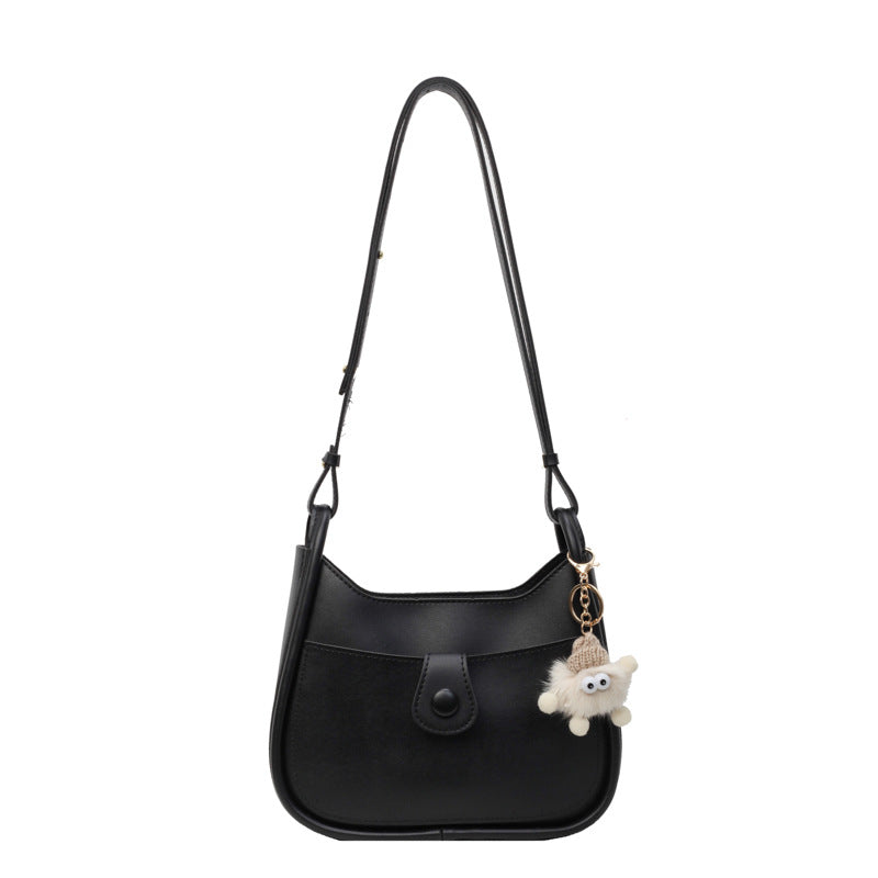 Damen Schultertasche aus hochwertigem Kunstleder mit verspieltem Charme