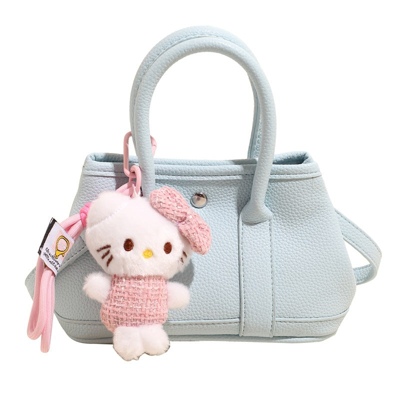 Damen Mini-Handtasche mit verspieltem Plüschanhänger