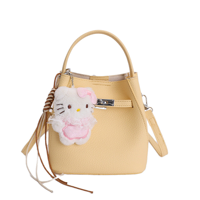 Damen Mini-Handtasche mit süßem Anhänger