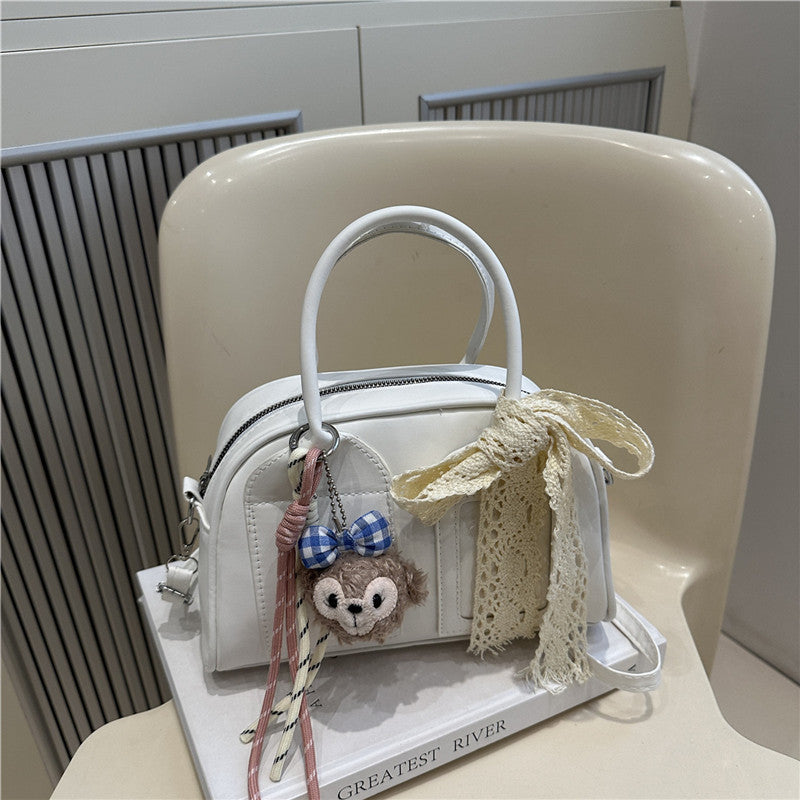 Damen Mini-Handtasche mit verspieltem Tiermotiv und charmantem Anhänger