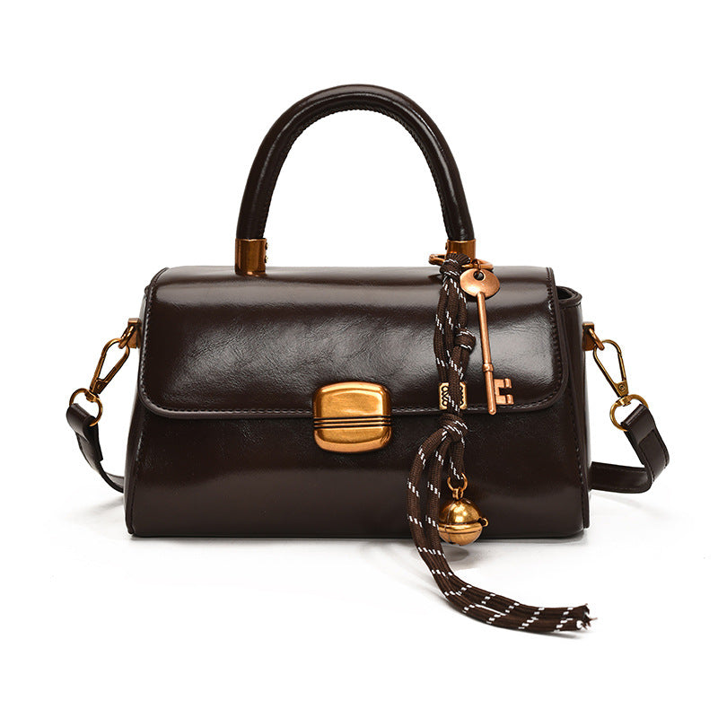 Damen elegante Handtasche mit goldenen Akzenten