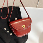 Damen Schultertasche im eleganten Retro-Design mit goldenen Akzenten