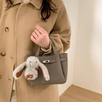 Damen Mini-Handtasche mit verspieltem Design und Tieranhänger