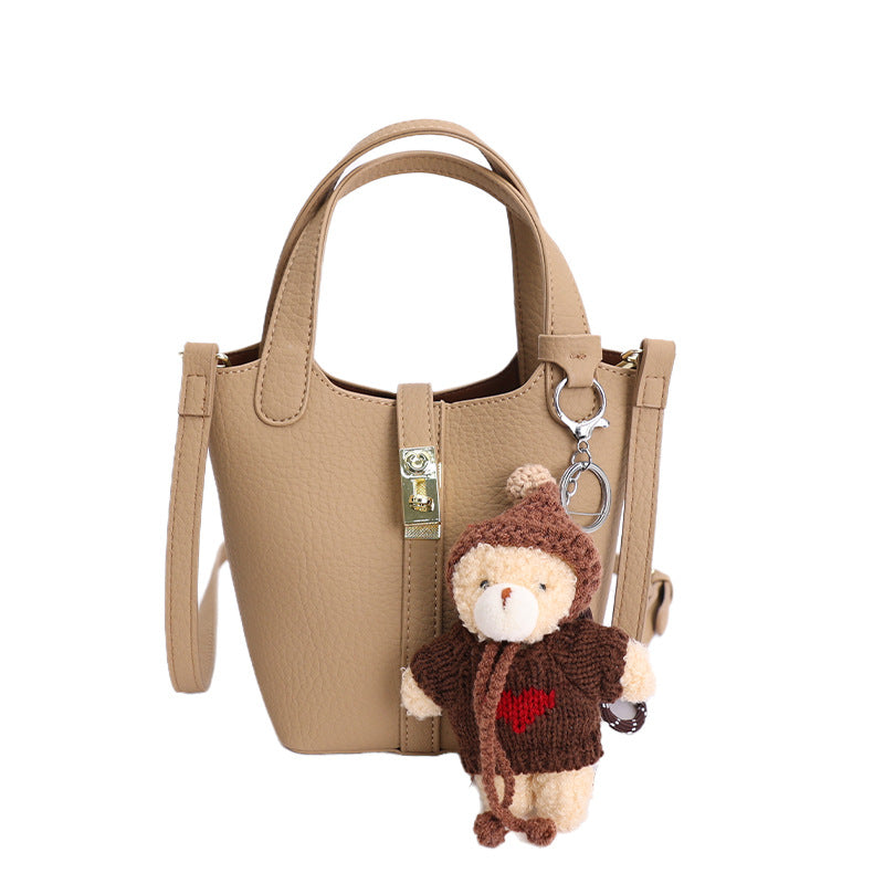 Damen Mini-Handtasche mit verspieltem Tieranhänger
