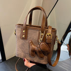 Damen-Mini-Tasche aus hochwertigem Material mit abnehmbarem witzigen Anhänger