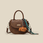Damen Mini-Handtasche mit verspieltem Detail und hochwertigem Kunstleder