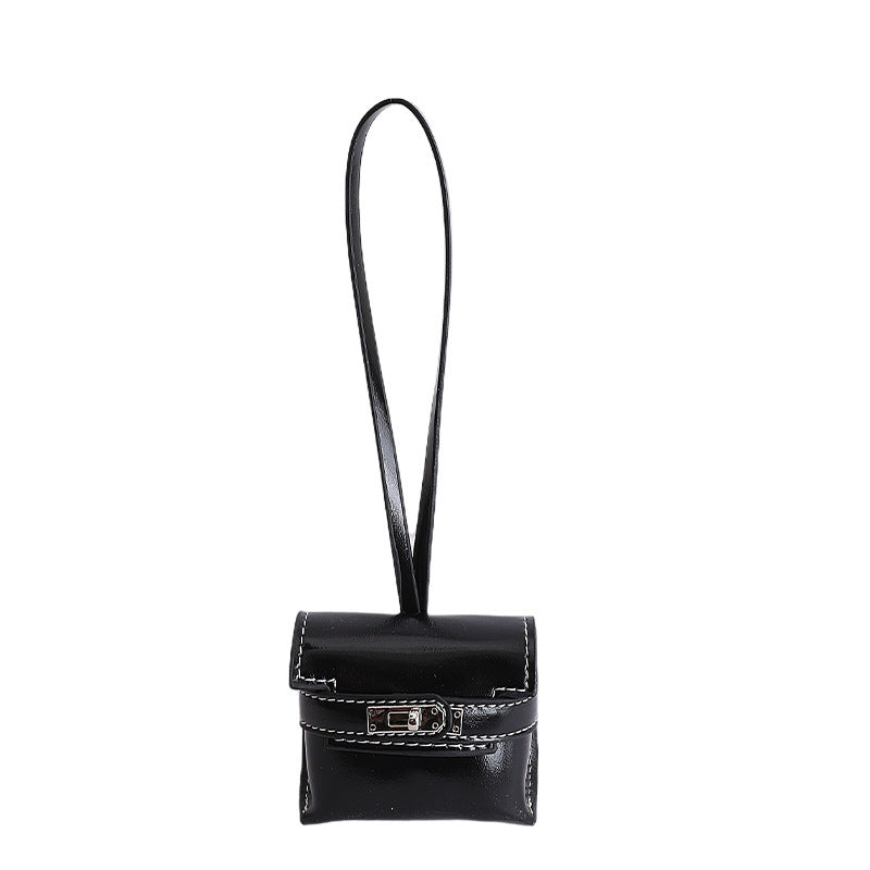 Damen Mini-Handtasche aus hochwertigem Kunstleder mit verspieltem Verschluss