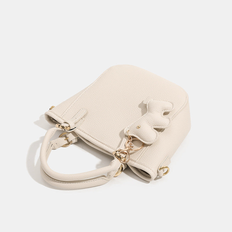 Damen Mini-Handtasche mit verspieltem Tieranhänger