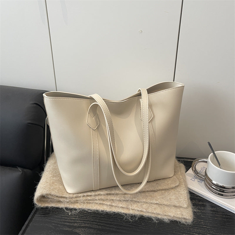 Damen elegante Tragetasche mit minimalistischer Struktur