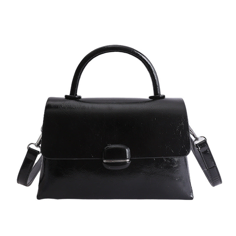 Damentasche mit strukturiertem Design und eleganter Verschluss