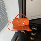 Damen Mini-Handtasche mit eleganter Schleifendekoration