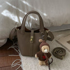 Damen Mini-Handtasche mit verspieltem Tieranhänger