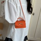 Damen Mini-Handtasche mit eleganter Schleifendekoration