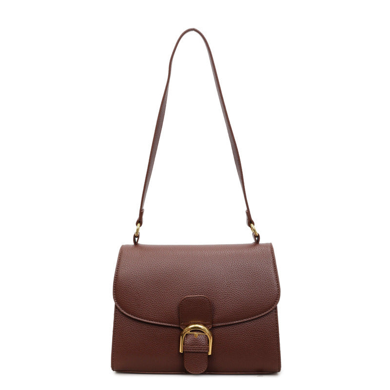 Damen Schultertasche mit elegantem Klappverschluss und dekorativem Metallakzent