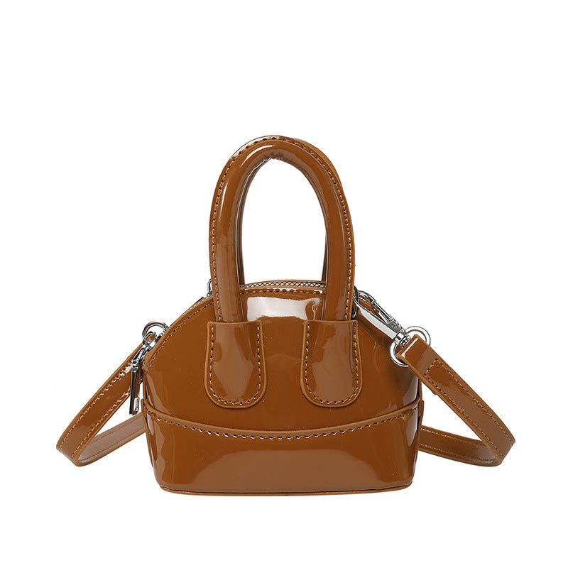 Damen Mini-Handtasche mit eleganter glänzender Oberfläche und abnehmbarem Schultergurt