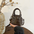 Damen Mini-Handtasche mit glänzender Oberfläche und modischem Reißverschluss